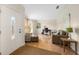 Inviting living area with light-filled window, tile flooring, and comfortable seating for a relaxing atmosphere at 1406 Woodcrest, North Port, FL 34286