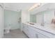Bright bathroom with double vanity, ample counter space, and a toilet at 14281 Heritage Landing Blvd # 1411, Punta Gorda, FL 33955