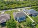 Aerial view of the property highlighting the screen enclosed pool and backyard within a fenced perimeter at 1508 Westover St, Port Charlotte, FL 33953