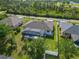 Aerial view of the property, its backyard pool and close proximity to other homes and nearby waterway at 1508 Westover St, Port Charlotte, FL 33953