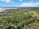 Picturesque aerial view featuring the surrounding waterfront landscape and wooded areas surrounding this community at 1508 Westover St, Port Charlotte, FL 33953