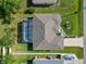 An aerial top-down view shows the backyard pool, lanai, and overall home layout at 1508 Westover St, Port Charlotte, FL 33953