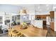 Open-concept dining area connects to a bright kitchen and living room, creating an inviting space at 1508 Westover St, Port Charlotte, FL 33953