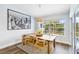Bright dining room with a large window, perfect for gatherings and enjoying meals at 1508 Westover St, Port Charlotte, FL 33953
