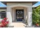 Stylish entryway with double doors, creating a grand and inviting welcome to the home at 1508 Westover St, Port Charlotte, FL 33953
