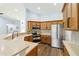 Modern kitchen featuring stainless steel appliances, countertops, and wood cabinets at 1508 Westover St, Port Charlotte, FL 33953