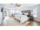 Spacious main bedroom features tray ceiling, sitting area, and access to the outdoor patio at 1508 Westover St, Port Charlotte, FL 33953