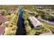 Beautiful aerial view of waterfront property with lush landscaping and waterway views at 1515 Forrest Nelson Blvd # L204, Port Charlotte, FL 33952
