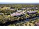 Scenic aerial view shows the community with a waterway and mature Florida trees at 1515 Forrest Nelson Blvd # L204, Port Charlotte, FL 33952