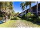 Building exterior with lush foliage at 1515 Forrest Nelson Blvd # L204, Port Charlotte, FL 33952