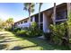 Charming two-story building with well-manicured landscaping at 1515 Forrest Nelson Blvd # L204, Port Charlotte, FL 33952