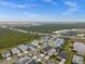 Expansive aerial shot of a residential area featuring well-manicured lawns and neatly arranged houses at 16240 Palmetto St, Punta Gorda, FL 33982