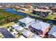 Stunning aerial view of waterfront property with boat docks, complemented by lush landscaping and serene surroundings at 2002 Bal Harbor Blvd # 1022, Punta Gorda, FL 33950