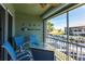 Inviting balcony features a table with chairs and scenic waterfront views at 2002 Bal Harbor Blvd # 1022, Punta Gorda, FL 33950