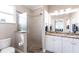 Bathroom features a glass shower, double sink vanity and granite countertops at 2002 Bal Harbor Blvd # 1022, Punta Gorda, FL 33950