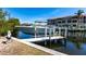 Private boat dock featuring a boat lift and easy access to the waterfront at 2002 Bal Harbor Blvd # 1022, Punta Gorda, FL 33950