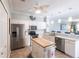 Modern kitchen with stainless steel appliances, a central island, and a stylish design at 2002 Bal Harbor Blvd # 1022, Punta Gorda, FL 33950