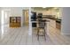Modern kitchen with sleek white cabinets, stainless steel appliances, and dark countertops at 22191 New Rochelle Ave, Port Charlotte, FL 33952