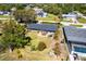 Home featuring a beautiful backyard with a patio and outdoor seating at 23179 Maclellan Ave, Port Charlotte, FL 33980