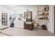 Basement with washer, dryer, utility sink, and storage shelves for organized living at 23179 Maclellan Ave, Port Charlotte, FL 33980