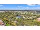 Breathtaking aerial view featuring expansive waterways, lush foliage, and well-manicured lawns at 238 Southampton Dr # 319, Venice, FL 34293