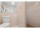 Bathroom features tiled shower stall with glass door and decorative tile accents at 238 Southampton Dr # 319, Venice, FL 34293