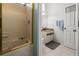 Cozy bathroom featuring tub-shower combination, vanity with sink, and white ceramic tiles at 238 Southampton Dr # 319, Venice, FL 34293