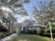 Charming single-story home with well-maintained landscaping and a welcoming front walkway at 238 Southampton Dr # 319, Venice, FL 34293