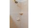 Shower features stylish tile work, a shower head and a built-in corner shelf at 238 Southampton Dr # 319, Venice, FL 34293