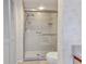 Shower with glass door and built in shelves in bathroom at 240 Lewis Cir # 28, Punta Gorda, FL 33950