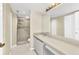 Bathroom featuring a single sink vanity and a walk-in shower at 240 Lewis Cir # 28, Punta Gorda, FL 33950