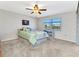 Relaxing bedroom featuring a serene view from the window, carpet, and an inviting atmosphere at 240 Lewis Cir # 28, Punta Gorda, FL 33950