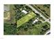 Overhead view of the property showcasing the layout and surrounding area, highlighting the lot at 2715 Taylor Rd, Punta Gorda, FL 33950