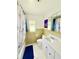Bathroom featuring a vanity with a sink and a shower with white marble print curtain at 2715 Taylor Rd, Punta Gorda, FL 33950