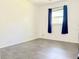 Bright and airy bedroom with large windows, offering a cozy retreat within the home at 2715 Taylor Rd, Punta Gorda, FL 33950