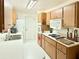 Efficient kitchen space with white countertops and matching appliances, perfect for cooking at 2715 Taylor Rd, Punta Gorda, FL 33950