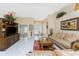 Comfortable living room features neutral decor and natural light at 27394 Natal Dr, Punta Gorda, FL 33983