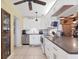 Modern kitchen with white cabinets, stainless steel appliances, and a bright, clean design perfect for cooking at 301 Palmetto Ne Dr, Port Charlotte, FL 33952