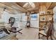 Comfortable living room with distinctive wood ceiling, tile flooring, and natural light; great for relaxation at 301 Palmetto Ne Dr, Port Charlotte, FL 33952