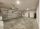 Spacious two-car garage with ample storage space and high ceilings at 354 Porto Alegre St, Punta Gorda, FL 33983