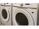 Laundry room showcasing modern washer and dryer at 354 Porto Alegre St, Punta Gorda, FL 33983