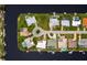 An aerial view shows a beautiful home with a private pool and boat dock on a waterfront canal at 548 Belvedere Ct, Punta Gorda, FL 33950