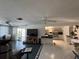 Open floor plan showcasing living room connected to the kitchen, with bright, natural light at 548 Belvedere Ct, Punta Gorda, FL 33950