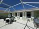 View of outdoor seating and backyard patio featuring a roof to provide shade at 548 Belvedere Ct, Punta Gorda, FL 33950