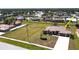 Lovely single-Gathering home with a tile roof, mature landscaping, and an extended driveway, perfect for suburban living at 569 Royal Poinciana, Punta Gorda, FL 33955