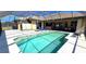 Screened in pool with covered patio, shed and lawn chairs at 569 Royal Poinciana, Punta Gorda, FL 33955