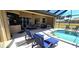 Screened lanai with pool and ample patio furniture at 569 Royal Poinciana, Punta Gorda, FL 33955