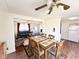 The dining room has an open view into the living room at 6821 Ocean Ct # Lot 30, North Port, FL 34287