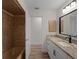 Bathroom features a shower and tub combination, vanity, and modern fixtures at 908 Tropical Nw Cir, Port Charlotte, FL 33948