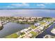 Aerial view of waterfront community featuring residences with water access and views at 103 Colony Point Dr, Punta Gorda, FL 33950